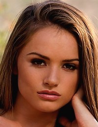 Tori Black uses a blue toy that matches her blue dress